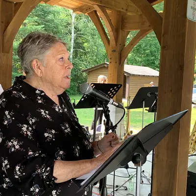 Image shows Mayor Liz Danielsen speaking.