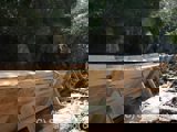 Image shows the new log chute, largely completed. 