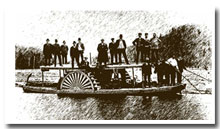 Image shows men standing on a wooden boat powered by turbines.
