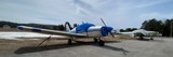 Image shows two airplanes on a tarmac. 