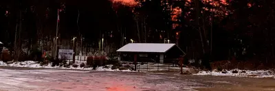 Image the Dorset Ice Palace with a sunset in the background.